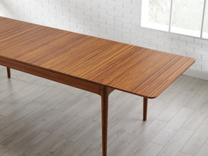 Erikka 110" Double-Leaves Extensible Dining Table - Amber