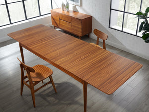 Erikka 110" Double-Leaves Extensible Dining Table - Amber
